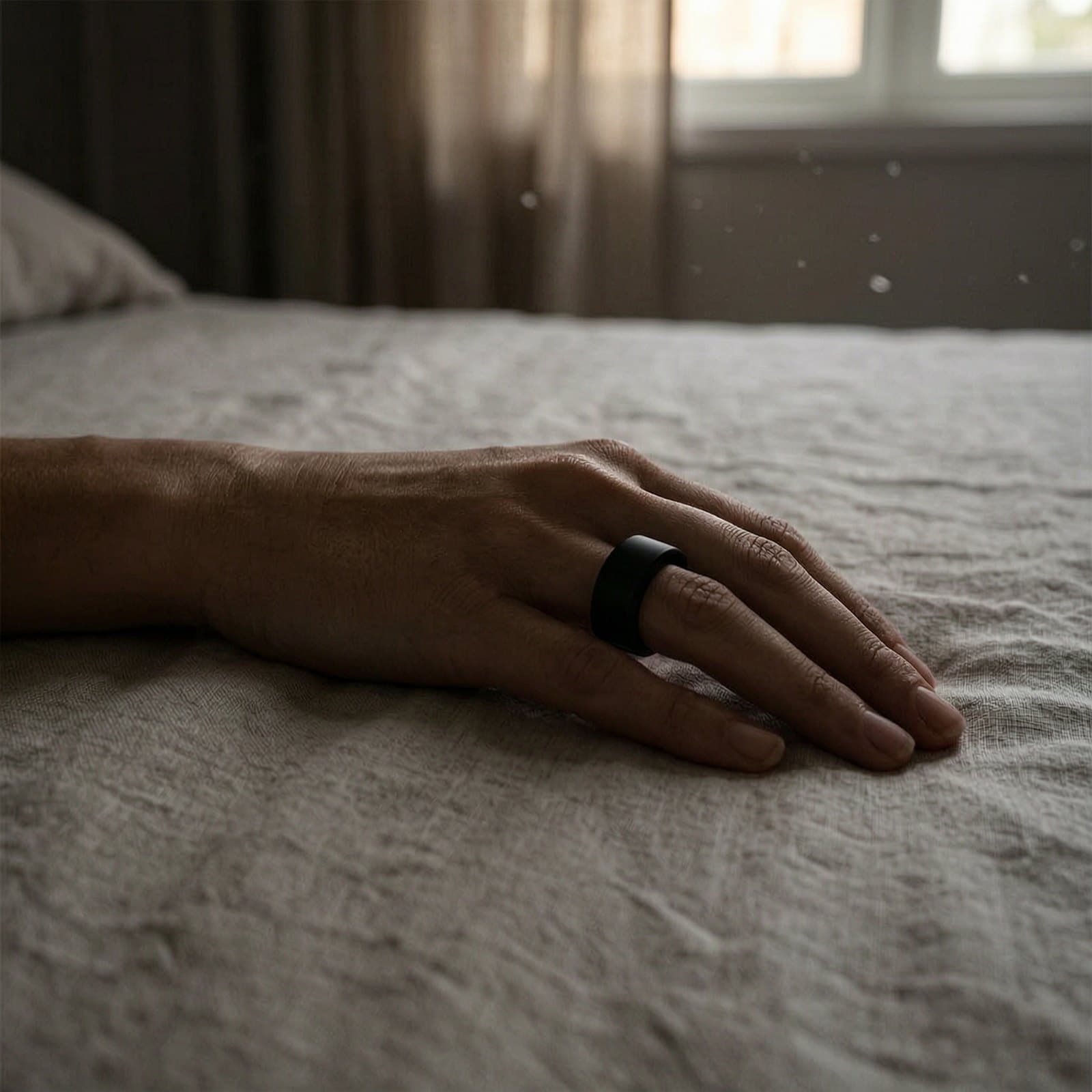 The Pulse Ring on a sleeping hand in early morning light